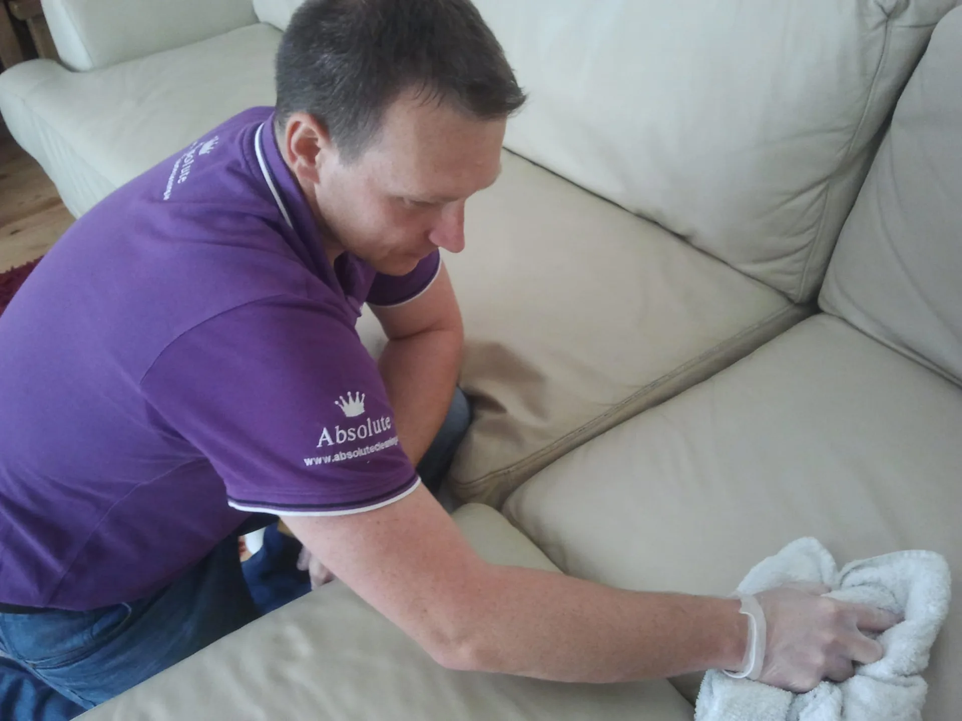 Professional upholstery cleaning service in action