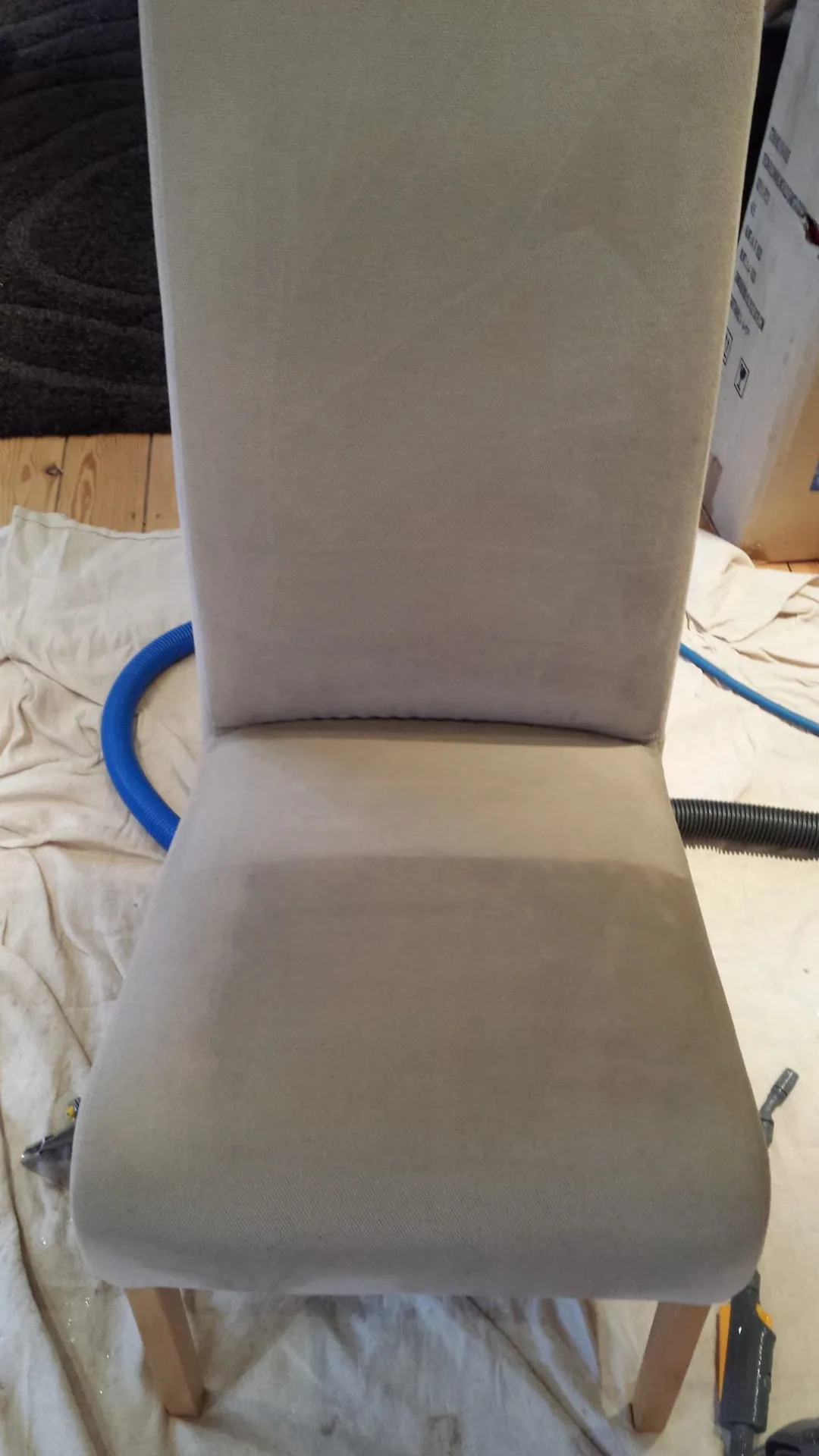 Freshly cleaned gray upholstered chair